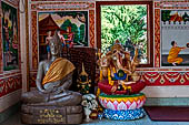 Vientiane, Laos - Pha That Luang, among the Other structures on the ground there is an open sala decorated with brightly colored paintings.  